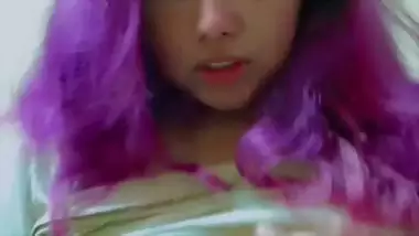 Purple head desi girl holding huge milk tankers